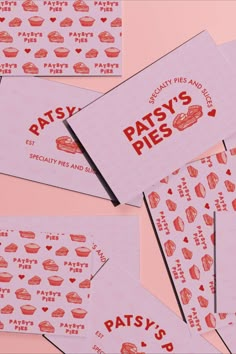 several pieces of pink paper with red designs on them and the words patsy's pies