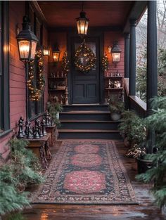 the front porch is decorated for christmas with wreaths and lights