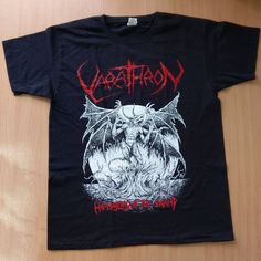 VARATHRON - His Majesty At The Swamp (T-Shirt)T-shirtHigh Quality Silkscreen Print, 2 Colors, Big Front ImageBand: VARATHRONTitle: His Majesty At The SwampCondition: newColour: BlackMaterial: Cotton 100%...Feel free to ask other sizes...-------------------------- Registered worldwide airmail shipping with tracking number- Safe packaging- Combine orders support- Feel free to ask any questions Silkscreen Print, Silk Screen Printing, Favorite Shirts, Vintage Shirts, Mens Clothing Styles, Tee Shirt, Tops & Tees, One Piece, T-shirt