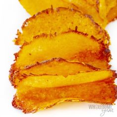 slices of sweet potato chips on a white background