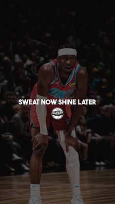 a man standing on top of a basketball court with the words sweat now shine later