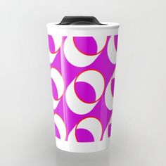 a purple and white coffee cup with circles on it