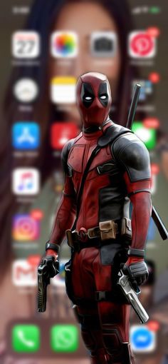 the deadpool character is standing in front of an iphone screen