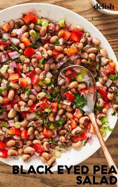 a white plate topped with black eyed pea salad