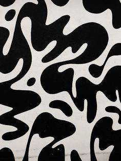 a black and white animal print pattern on the side of a building