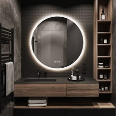 a bathroom with a round mirror above the sink and shelves on either side of it