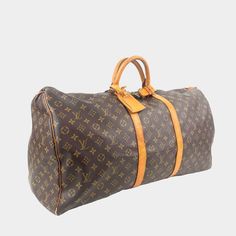 Description: FINAL SALE Louis Vuitton Weekender Bag Brownted Canvas LV Monogram Brass Hardware Leather Trim Rolled Handles Canvas Lining Zip Closure at Top Includes Dust Bag Measurements: Shoulder Strap Drop: 18.5" Handle Drop: 4" Height: 12.25" Width: 12.75" Depth: 10.5" THIS ITEM IS FINAL SALE. SKU: KEEPALL60M-LV-11302-3423 Please remember that most of the items that we carry have been previously owned. Louis Vuitton Weekender, Louis Vuitton Keepall, Bag Measurements, Lv Monogram, Brown Coat, Sierra Leone, Casual Backpack, Brass Hardware, Weekender Bag