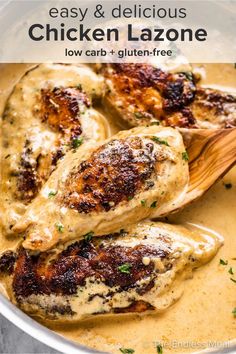 the chicken is being cooked in a skillet with sauce and parsley on top