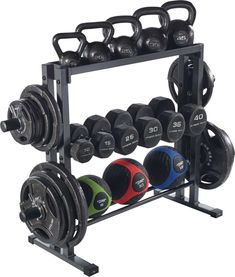 a gym rack with dumbs and plates on the top, holding two rows of kettles