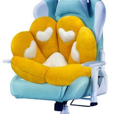 a yellow and white teddy bear sitting in a blue office chair with arms folded out