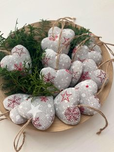 some white and red ornaments on a wooden plate