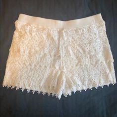 Express Ivory Crochet Shorts. Nwt Never Worn. Size M Casual White Bottoms With Crochet Trim, White Lace Trim Bottoms For Day Out, White Casual Bottoms With Crochet Trim, Casual White Bottoms With Crochet Lace, White Lace Bottoms For Day Out, White Casual Bottoms With Crochet Lace, White Crochet Lace Bottoms For Vacation, White Crochet Lace Casual Bottoms, White Crochet Trim Shorts For Summer