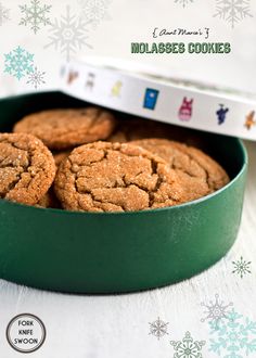 some cookies are in a green bowl on a table