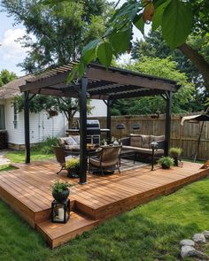 a wooden deck in the middle of a yard