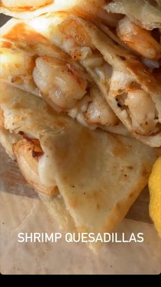 shrimp quesadillas stacked on top of each other