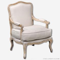 an old fashioned chair with white linen upholstered on the back