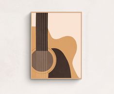 a book with an acoustic guitar on it's cover, against a white wall