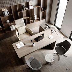 an aerial view of a desk and chairs