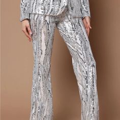 Fashion Nova Portia Sequin Flare Pant. New With Tags Spring Sequined Stretch Bottoms, Spring Sequin Stretch Bottoms, Summer Party Pantsuit With High-waisted Pants, Spring Stretch Sequin Bottoms, Summer High-waisted Pantsuit For Party, High Waist Stretch Pantsuit For Party, Stretch High Waist Pantsuit For Party, Stretch High-waist Pantsuit For Party, Summer Party High-waisted Pantsuit