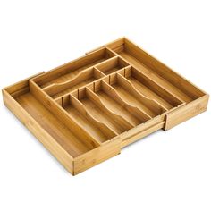 an empty wooden tray with compartments on it