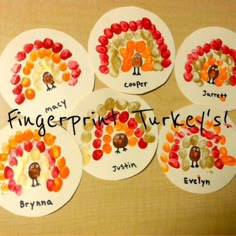 four turkey fingerprints with the names of each individual child's name on them