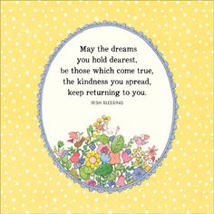 an oval frame with flowers in the center and a quote on it that says, may the dreams you hold dearest be those which come true,