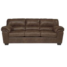 a brown couch sitting on top of a white floor