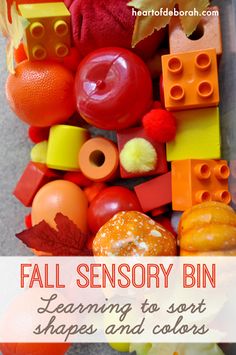 a pile of legos sitting next to each other with text overlay that reads fall sensory bin learning to sort shapes and colors