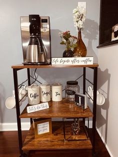 a shelf with coffee mugs and other items on it