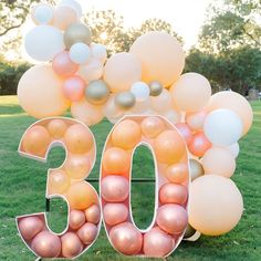 a large number sign made out of balloons