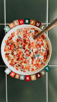 a bowl of cereal with the words colorful breakfast spelled in letters