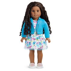 the doll is wearing a blue jacket and dress