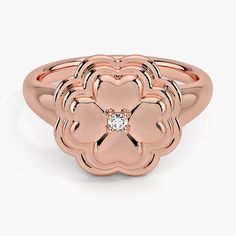 Clover Diamond Ring - 14K Rose Gold. A lucky four leaf clover is crafted from the silhouettes of hearts in this unique and sentimental ring. A shining diamond rests at the center to complete the look with a hint of sparkle. Luxury Rose Gold Flower Ring With Brilliant Cut, Elegant Rose Gold Flower-shaped Ring, Fine Jewelry Rose Gold Diamond Flower Ring, Fine Jewelry Rose Gold Flower Ring With Brilliant Cut, Rose Gold Flower Diamond Ring Fine Jewelry, Rose Gold Flower Ring With Brilliant Cut, Rose Gold Brilliant Cut Flower Ring Fine Jewelry, Anniversary Rose Gold Flower Ring With Brilliant Cut, Luxury Rose Gold Diamond Flower Ring