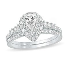 a pear shaped diamond engagement ring set in white gold