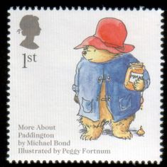 a postage stamp with a drawing of a bear wearing a jacket and hat, holding a jar of peanut butter