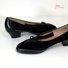 "Vintage 1970's or 80's pumps in black suede and embossed leather.  Beautiful details include lacing at the toe with patent leather bow and tiny brass hoop fittings, contrast white stitching, padded arch support in leather, and sturdy non-slip rubber sole.  A very feminine shoe that's comfortable and superbly made.  Label: Selby (rubber sole marked Contura).      S I Z I N G      printed size8 1/2 inside length10\"  inside width3\" heel height1 1/2\"      C O N D I T I O N      Excellent.  Two small dings on the right heel.       MORE VINTAGE SHOES      http://www.etsy.com/shop/JacquieVintage?section_id=6769886      BROWSE MY SHOP      http://etsy.com/shop/jacquievintage      CONNECT WITH ME      twitterjacquievintage facebookwww.facebook.com/JacquieVintage   pinterestjacquievintage" Shoes 80s, 80s Shoes, Feminine Shoes, Low Heel Pumps, Black Leather Pumps, Black Suede Pumps, Womens Pumps, Leather Bow, Leather Bows