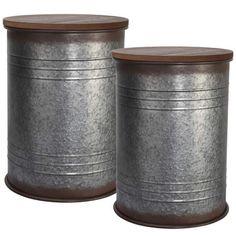 two metal canisters with wood lids