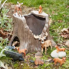 A hollow tree stump used as hiding spots for little animals Enchanted Tree, Play Props, Hollow Tree, Yellow Door, Yellow Doors, Small World Play, Big Tree, Tree Stump, Fantasy Adventure