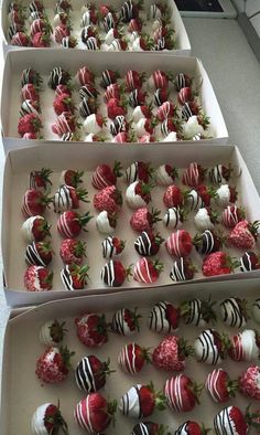 three boxes filled with strawberries and chocolate covered strawberries on top of each other