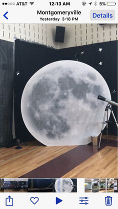 an image of the moon taken in front of a camera on a triptych