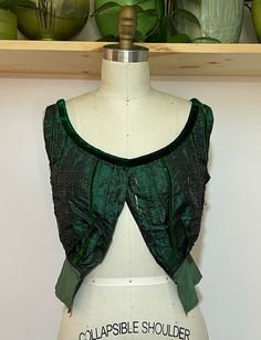 "Antique victorian satin and velvet emerald green vest. Great colors/shape. Nice vintage condition with wear thats consistent with age. Please see photos for reference.   This garment is fragile and coming apart, still very wearable or a great reference item.  Shoulder 14.5\" Pit to pit 17\" Length 17\"" Uniform Dress, Green Vest, Vest Outfits, Color Shapes, Western Outfits, Antique Victorian, Womens Vest, Emerald Green, Vintage Dresses