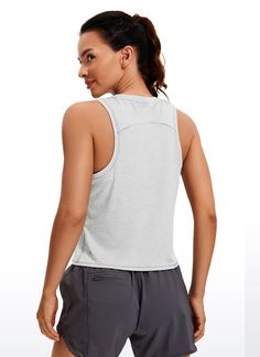 Ultra-lightweight and soft fabric with good breathability to keep you cool, and ultra-fine brushed feel for a comfortable and skin-friendly experience. High neck sport tank top with oversized armholes allows you to move freely without restraint. Great for running, exercise and other intense sports. Feature & Fitting: 
 Design for running, exercise 
 Cropped length, loose-fitting 
 Oversized armholes and high neck 
 Fabric: 
 Soft and lightweight fabric 
 Ultra-fine brushed feel 
 Four-way st Breathable Sleeveless Activewear For Yoga, High Stretch Mesh Back Tank Top In Athleisure Style, Comfortable Stretch Gray Tops, Comfortable Gray Stretch Top, Racerback Sports Tops With 4-way Stretch, Sports Racerback Top With 4-way Stretch, Gray Go-dry Tops For Light Sports, Sporty Racerback Tank Top For Gym, Sleeveless Sports Bra With 4-way Stretch