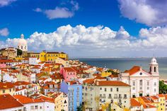 colorful buildings line the edge of a large body of water