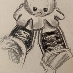 a drawing of a pair of shoes with an angry face