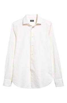 Presented in classic white, this long-sleeve button-up is crafted from a soft, breathable blend of cotton, linen and silk for year-round comfort. Front button closure Point collar Long sleeves with button cuffs 60% cotton, 25% linen, 15% silk Dry clean Made in Italy Men's Designer Clothing Mens White Button Up, White Cotton Dress Shirt With Button Cuffs, Formal Cream Cotton Top, Cream Cotton Top For Formal Occasions, Elegant White Cotton Dress Shirt, White Elegant Cotton Dress Shirt, White Cotton Dress Shirt For Business Casual, Timeless Long Sleeve Cotton Shirt, Classic Formal Cream Shirt