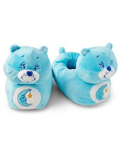 Be cute and cozy in these blue Care Bears slippers! These fun slippers are the perfect way to stay warm whenever you're hanging out at home. Officially licensed Material: Polyester Care: Spot clean Imported Care Bear Slippers, Fun Slippers, Titanium Belly Ring, Bear Slippers, Valentine's Day Gift Baskets, Magnetic Earrings, Titanium Jewelry, Care Bears, Dream Shoes