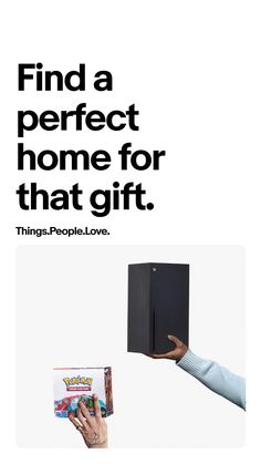 a person holding a black box with the words find a perfect home for that gift