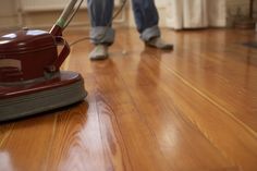 a person with a mop on the floor