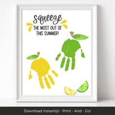 a framed print with the words squeeze the most out of this summer and hand prints