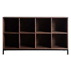 an open bookcase with many compartments on the top and bottom, against a white background